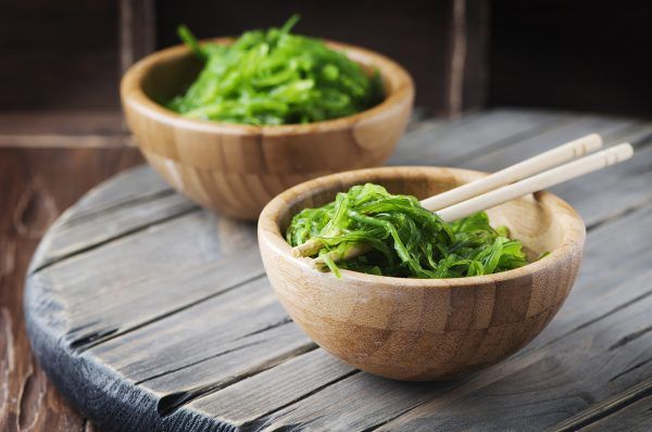 Traditional Japanese salad chuka on the wooden table, selective focus