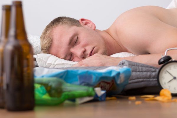 Young man is trying to sleep off last night's party